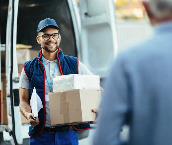 delivery-men-loading-carboard-boxes-van-while-getting-ready-shipment